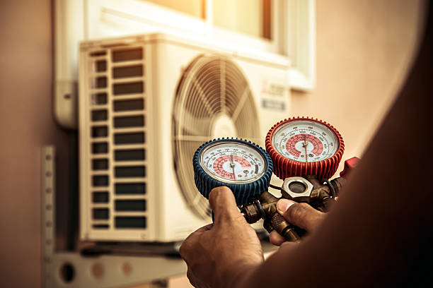 Professional Air Conditioning Service technician working in Elkin, NC